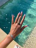 BAGUE RHODES