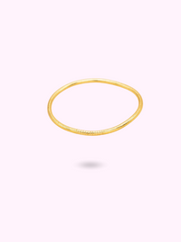 FINE GOLDEN BUDDHIST BANGLE